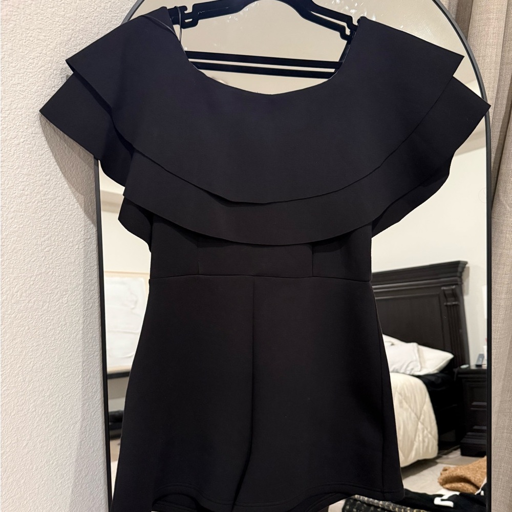 Elegant Black Ruffled shorts ( one piece)
Romper